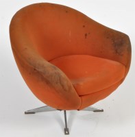 Lot 1007 - A 1960's swivel armchair, loosely upholstered...