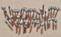 Lot 1029 - 1960's flatware and cutlery, with wooden...