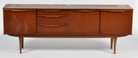 Lot 1037 - A 1960's teak sideboard, fitted three drawers...