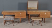 Lot 1046 - Two 1960's teak dressing tables, one with...