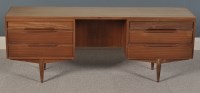 Lot 1049 - A 1960 G-Plan style teak dressing table, with...