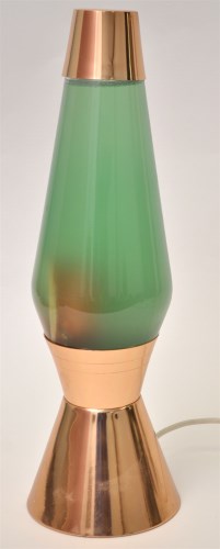 Lot 1060 - A brass lava lamp, with green interior, 43cms.