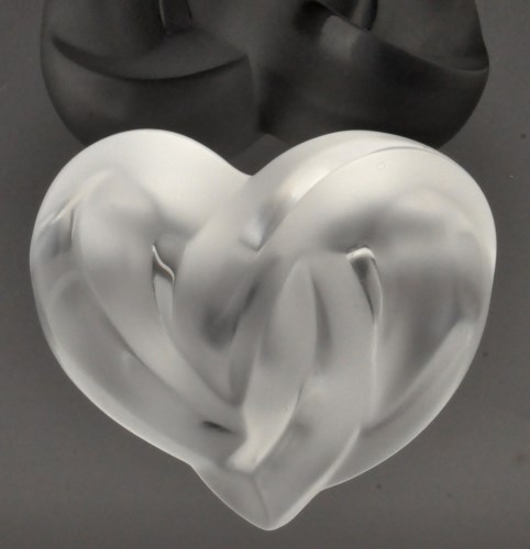 Lot 1079 - Lalique, France: a glass knotted heart...