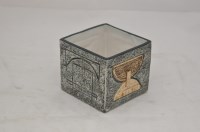 Lot 1099 - A Troika pottery cube vase, moulded with...