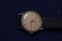 Lot 63 - A steel cased Omega wristwatch with arabic...