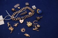 Lot 67 - A yellow metal curb link bracelet stamped '9c'...