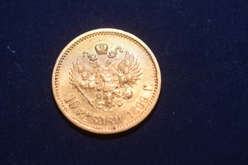 Lot 70 - A Russian Nicholas II gold ten rouble, 1899.