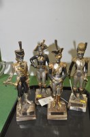 Lot 208 - Cast metal figurines of soldiers, on marble...
