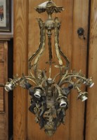 Lot 284 - A brass and patinated metal chandelier, floral...