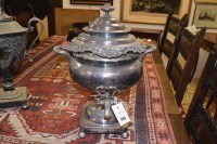 Lot 339 - A silver-plated tea urn decorated with...
