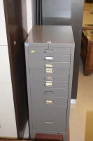 Lot 478 - A metal filing cabinet with an arrangement of...