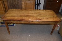 Lot 548 - A rustic kitchen dining table, with walnut...
