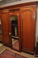 Lot 617 - A Victorian mahogany wardrobe with flared...