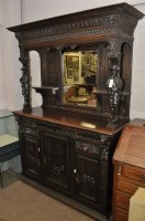 Lot 630 - Large Continental style heavily carved and...
