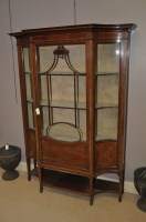 Lot 645 - An Edwardian inlaid mahogany display cabinet,...