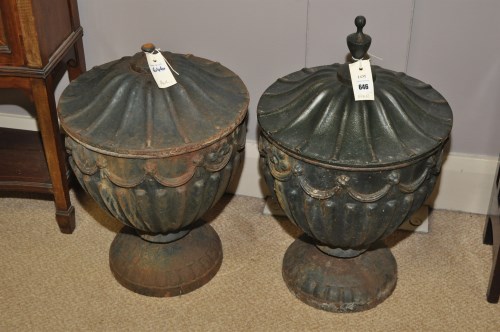 Lot 646 - A pair of modern cast iron garden urns with...