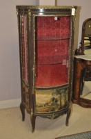 Lot 654 - A French display cabinet with shaped front,...