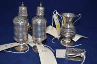 Lot 176 - A pair of silver baluster form pepperettes; a...