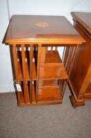 Lot 544 - Two reproduction revolving bookcases in yew...