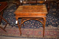 Lot 575 - A reproduction hardwood writing table, the...