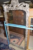 Lot 644 - A large Georgian style arched bevelled mirror...