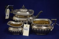 Lot 109 - A three-piece silver tea service, by Elkington...