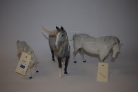 Lot 369 - Three Beswick ceramic models of horses.