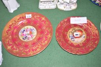 Lot 384 - Two Royal Worcester plates on red ground with...
