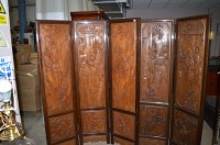 Lot 551 - A modern carved Oriental hardwood four-fold...