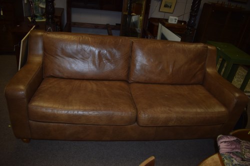 Lot 617 - A three-seater settee with loose seat and back...