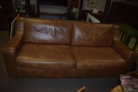 Lot 617 - A three-seater settee with loose seat and back...