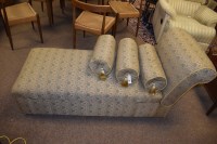 Lot 652 - A day bed, with floral upholstery adjustable...