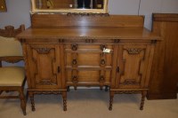 Lot 725 - A late 19th Century heavily carved oak...