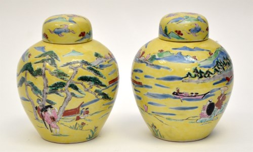 Lot 6 - Pair of yellow enamel ground oval shape vases...