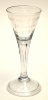 Lot 59 - Engraved plain stem wine glass, the stem with...
