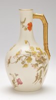Lot 120 - Royal Worcester penciled ivory ground ewer, of...