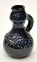 Lot 298 - An early 20th Century Elton ware jug, with...