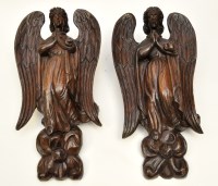Lot 307 - A pair of early 20th Century carved oak angels,...