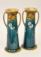 Lot 323 - A pair of Minton Ltd secessionist two-handled...