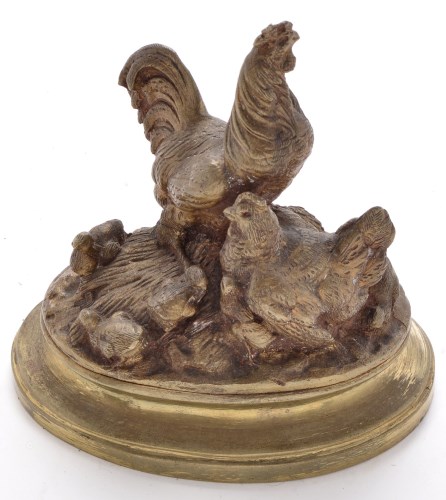Lot 355 - A bronze model of chickens on a naturalistic...