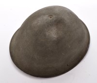 Lot 439 - A WWII British Mk III helmet, the green...