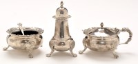 Lot 465 - An Elizabeth II three-piece silver condiment...
