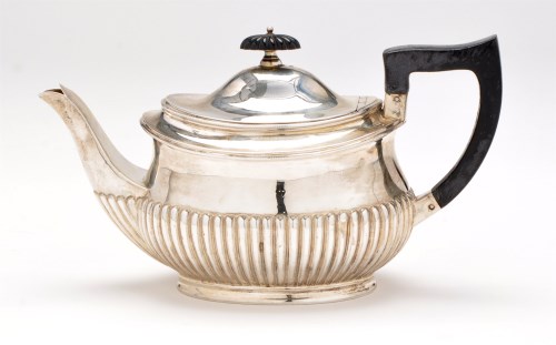 Lot 474 - An Edward VII silver teapot, by William Hutton...