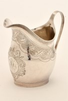 Lot 491 - A George III silver helmet form cream jug,...