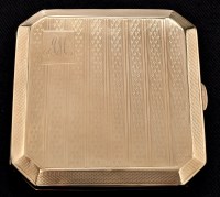 Lot 517 - A George V 9ct. yellow gold cigarette case, by...