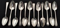 Lot 550 - A set of twelve George III silver tablespoons,...