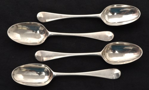 Lot 554 - Four George II silver dessert spoons, by James...