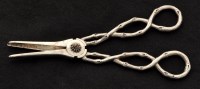 Lot 575 - A pair of Victorian silver grape scissors, by...