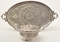 Lot 597 - A fine Persian white metal two-handled sugar...