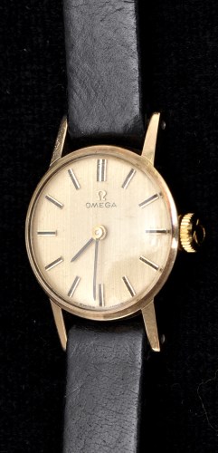 Lot 613 - Omega: a 9ct. gold cased lady's wristwatch,...